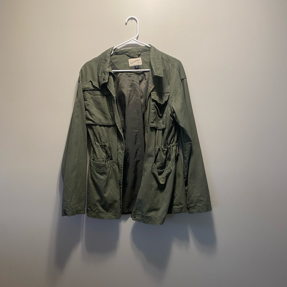 Green zip up jacket